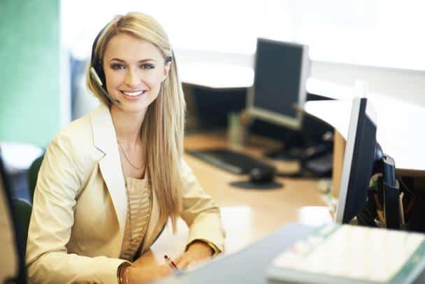 receptionist, Kelly at desk