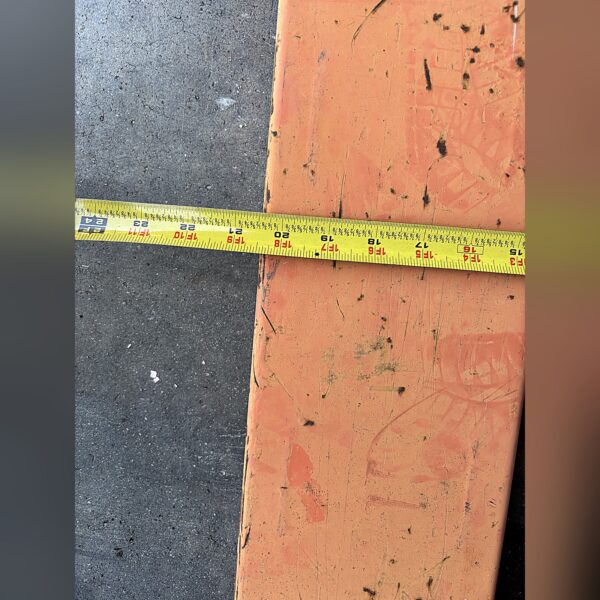 Tape measure across the BT LHM100UL fork showing roughly 20.5 inches of overall fork width