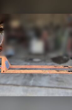 BT Toyota LHM100UL ultra-low pallet jack with 79-inch extra-long forks on a shop floor